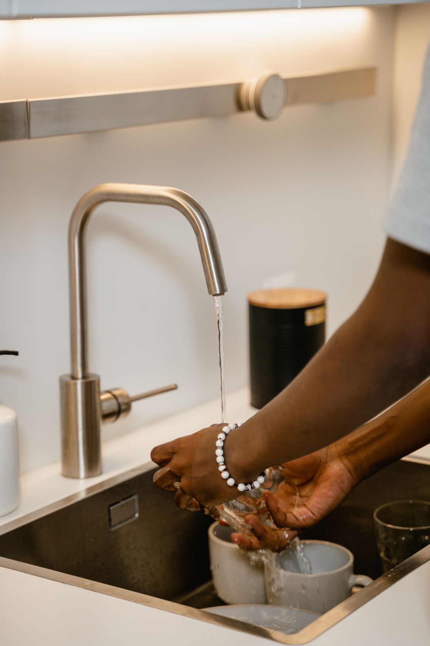 Modern kitchen faucet with running water
